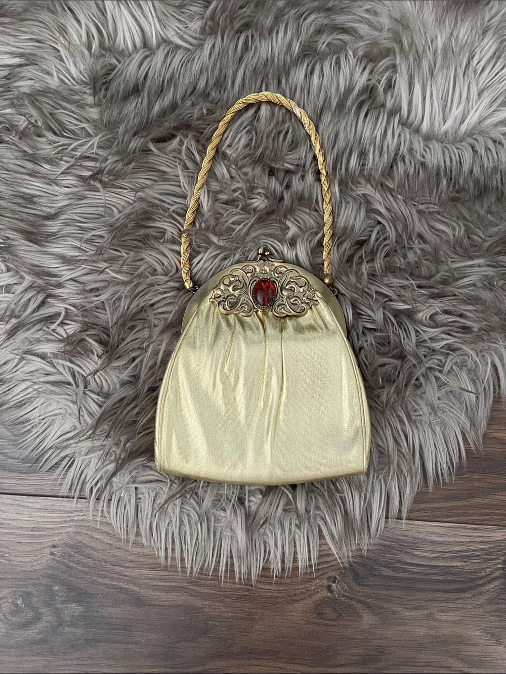Vintage Gold Evening Handbag with Red Jewel Accent